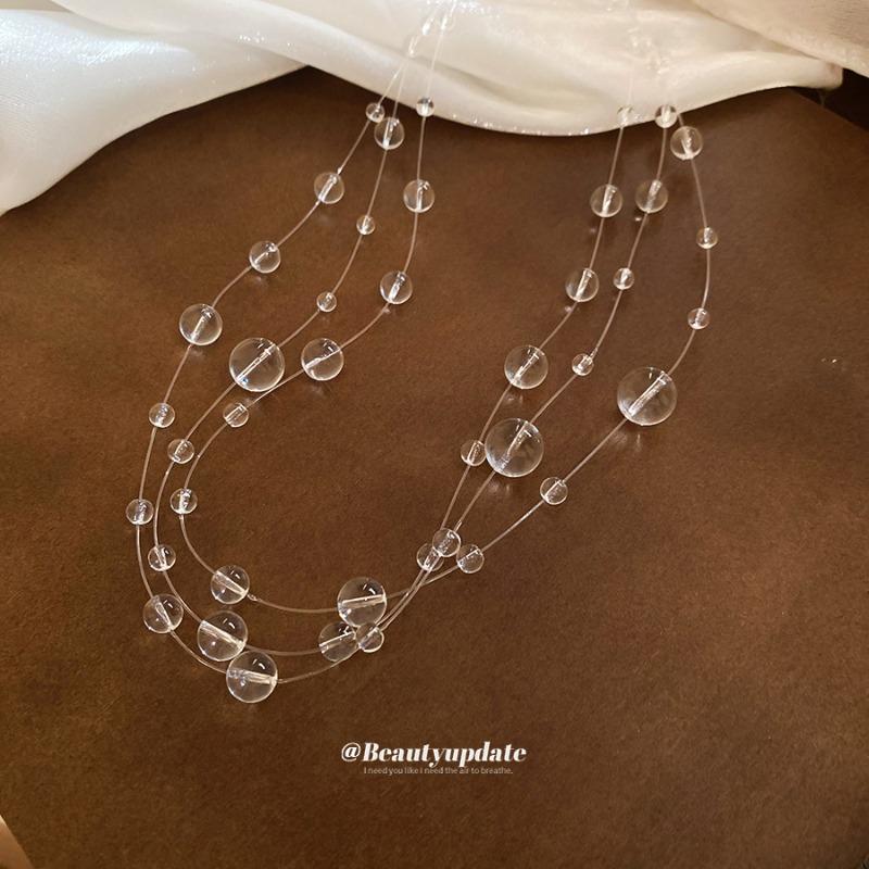 Irregular crystal beaded three-layer necklace, stylish and simple, versatile collarbone chain, personalized niche design, women s clothing