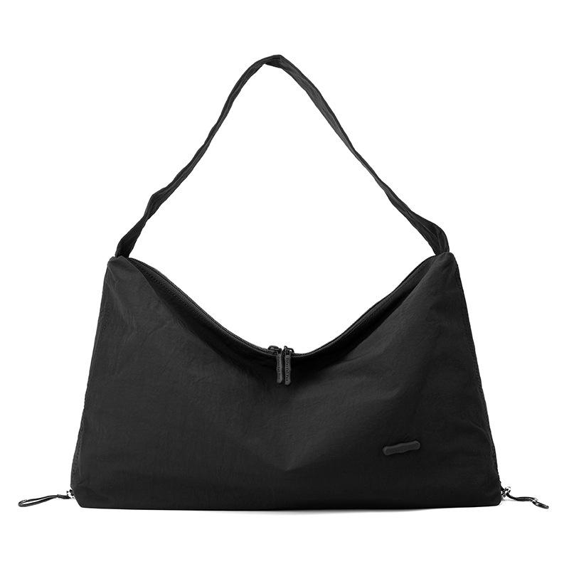 Korean style spring and summer new women's solid color high-end niche shoulder crossbody armpit bag
