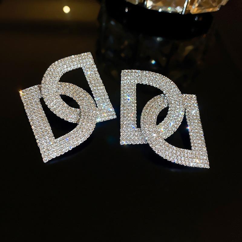 European and American Exaggerated Diamond-encrusted Flower Bow Fringed Earrings Personalized Earrings Internet Celebrity Temperament Earrings