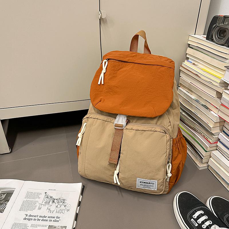 Outdoor japanische Farbkombination Rucksack große Kapazität Mehrfachtaschen Schultasche einfacher lässiger Rucksack Spritzwassergeschützt und verschleißfest