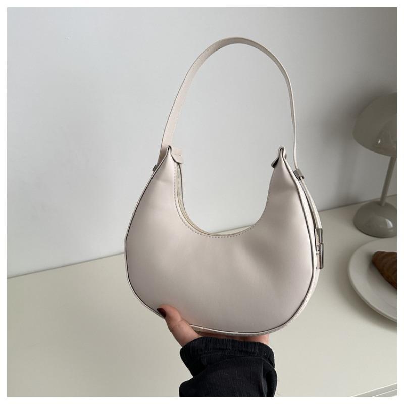 

Niche solid color design bag women s new trendy simple personalized underarm crescent bag personalized portable shoulder bag белый