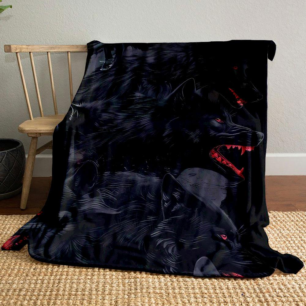 The pattern features dark wolves with red eyes and red snarling mouths on black. for all seasons blanket lunch break throw gift