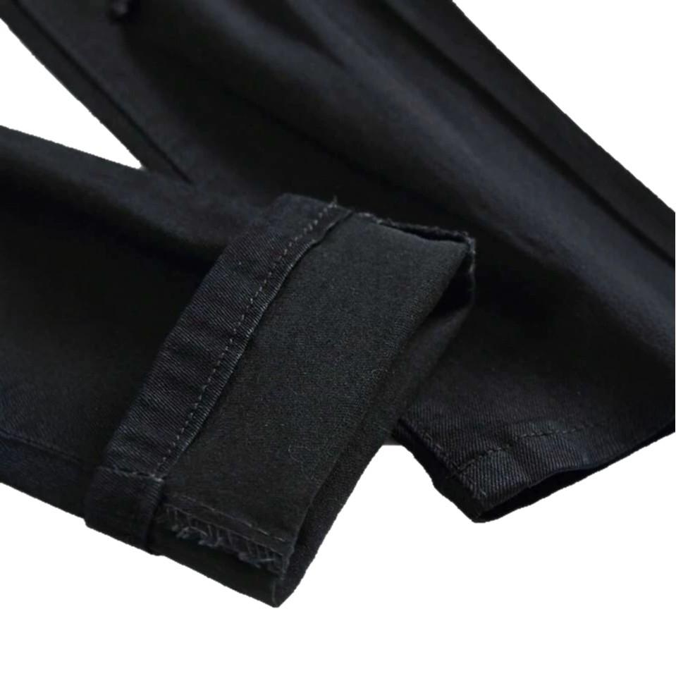 Jeans décontractés ajustés stretch noirs pour homme, principalement déchirés