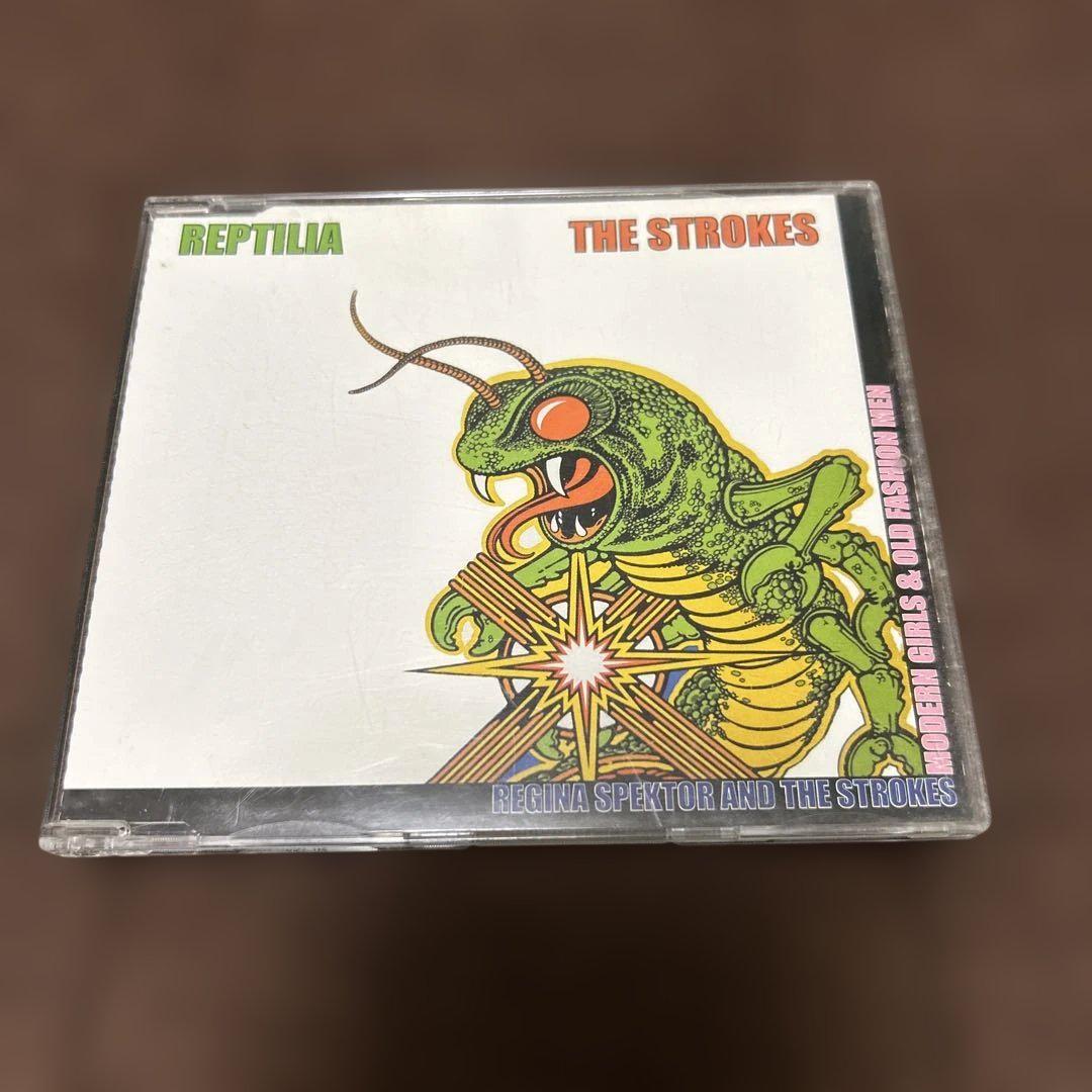 

[USED] THE STROKES REPTILIA
