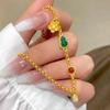 Elegantes chinesisches Gold-Kürbis-Armband mit jadegrünen Symbolen und floralen Details - Schmuckgeschenk für Damen