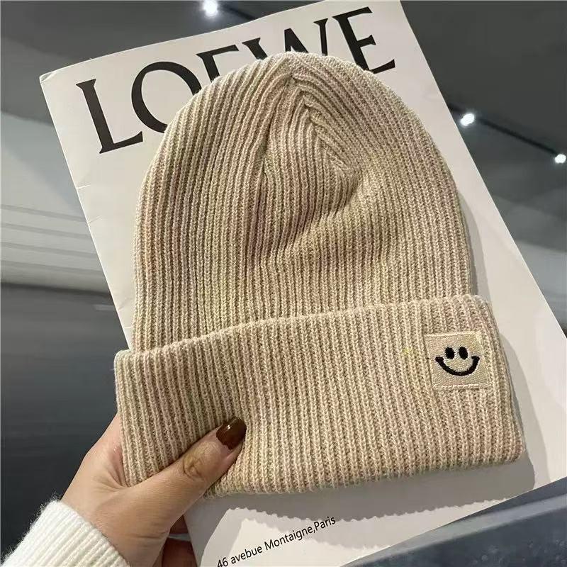 Devil smiley face label wool hat women's autumn and winter warm trend versatile ear protector black knitted hat