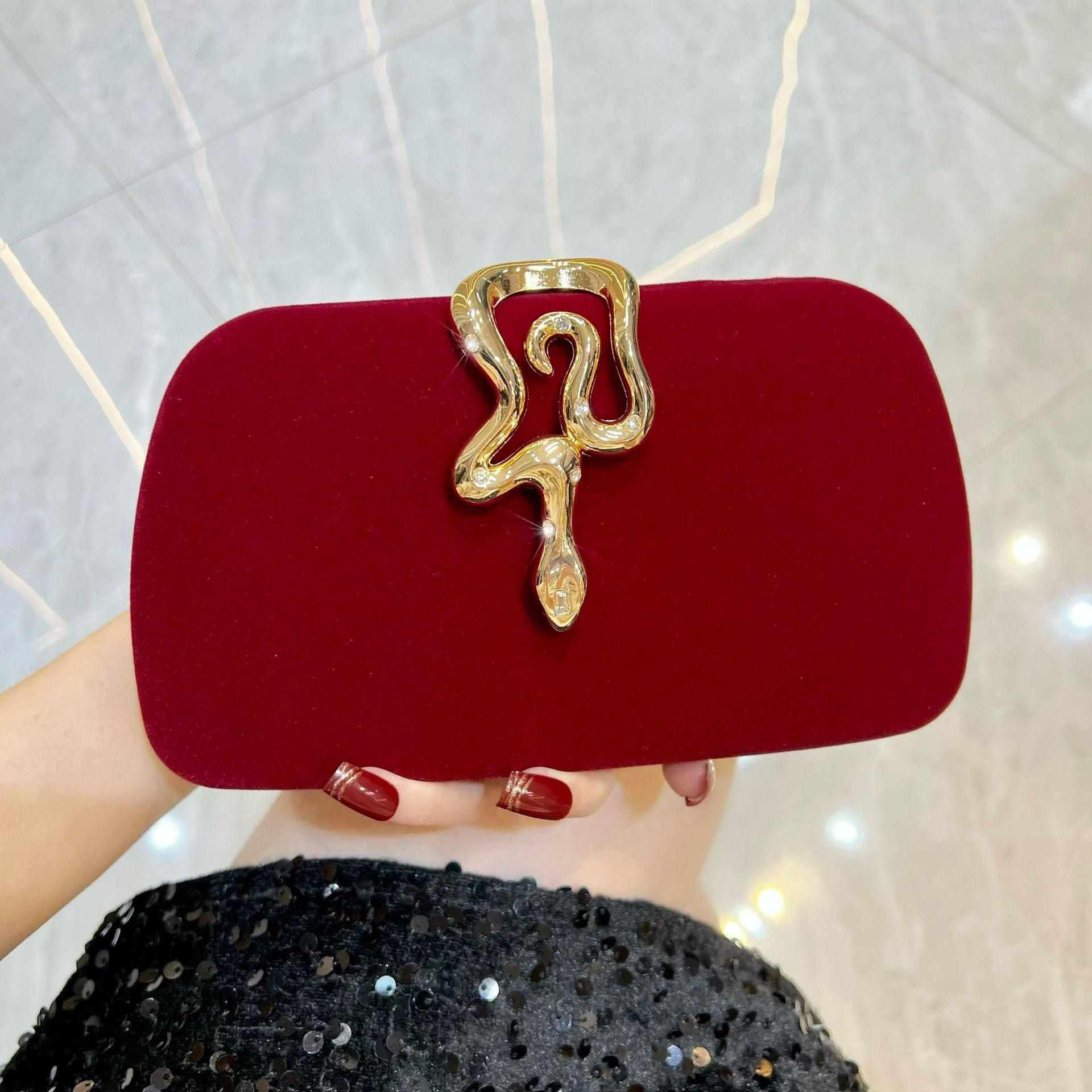 

New velvet clutch bag temperament messenger women s bag snake lock rhinestone dinner bag premium handbag