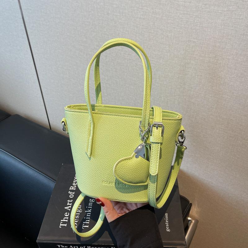 

Новые сумки-ведра женские модные и простые, летние универсальные сумки, вместительные текстурированные сумки-мессенджеры в тренде зелёный