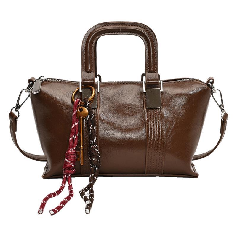 Retro texture small bag women 2025 new portable pillow bag premium versatile commuter messenger bag