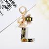 Talos Black Series Keychain Pendant, Dried Flower Initial Letter Charm Key Chain with Bee Tassel Design, A-Z Holder for Bag Purse Backpack