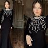 Luxurious Rhinestone-Embellished Feather Cuff Bandage Dress