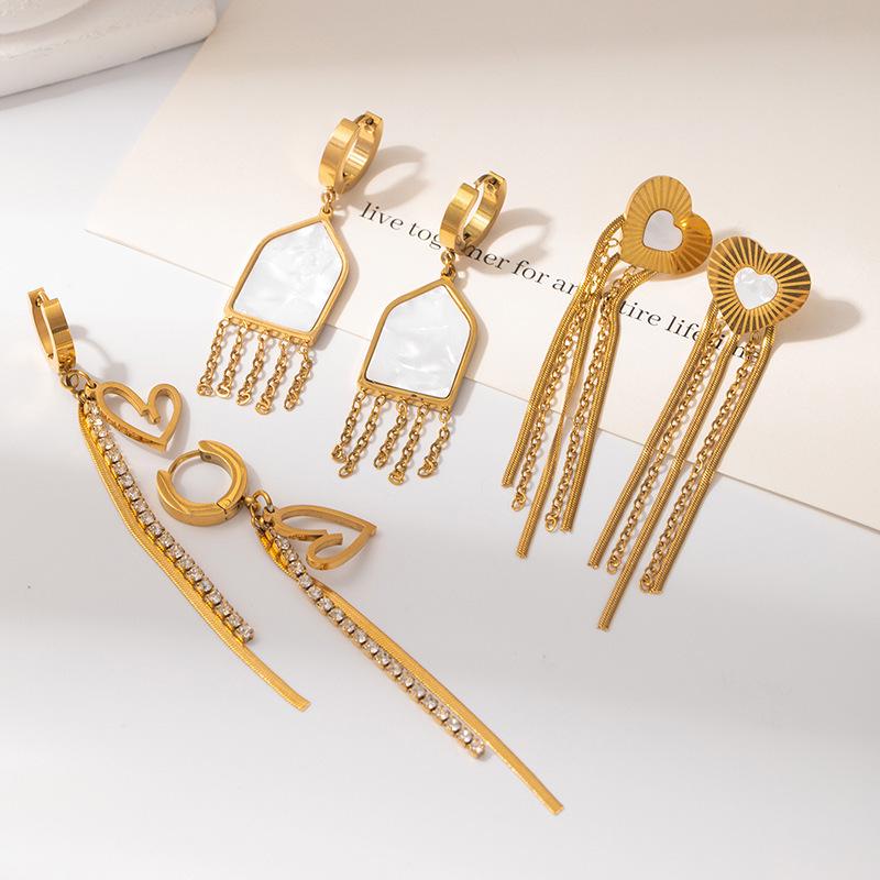 Geometric Hollow Heart Tassel Earrings: Titanium Steel Studs with Light Luxury Design.