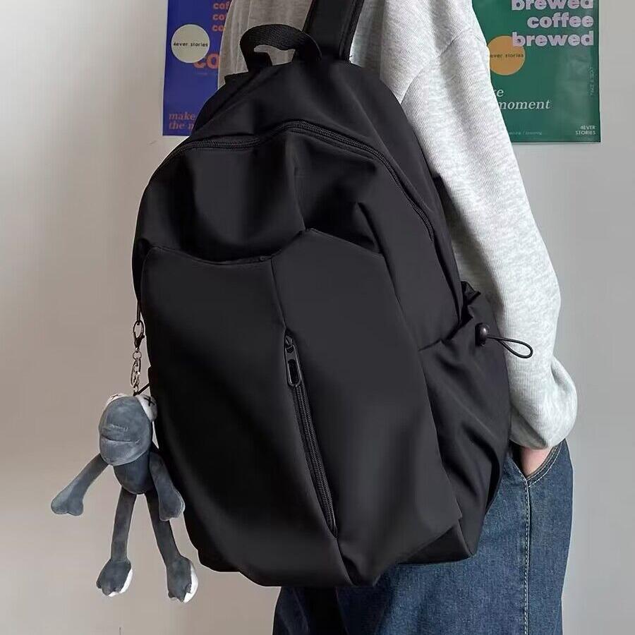 

Trendy Minimalist Backpack for Students: Large-Capacity Casual Bag for Men and Women чорний