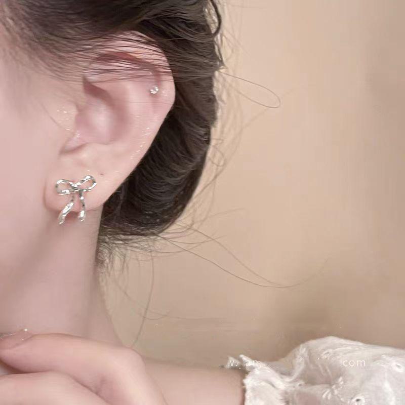 2025 Minimalist Silver Bow Earrings: Elegant, High-End, Unique Design for Women.