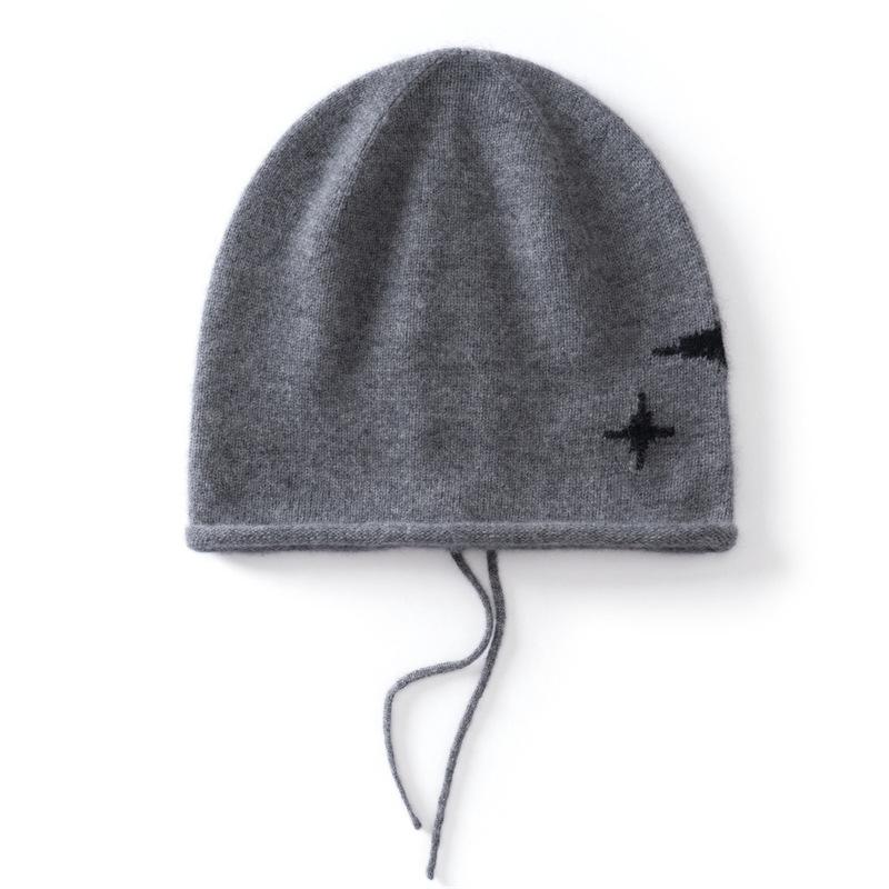 Autumn and winter temperament knitted drawstring stacking hat children crimped ear protection warm knitted hat windproof confinement hat