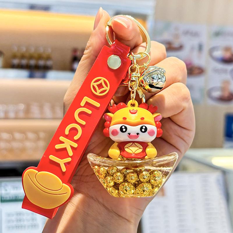 Akrylový přívěsek na klíče s tekutým pískem a obsahem oleje - Perfektní malý dárek na tašku nebo do auta.