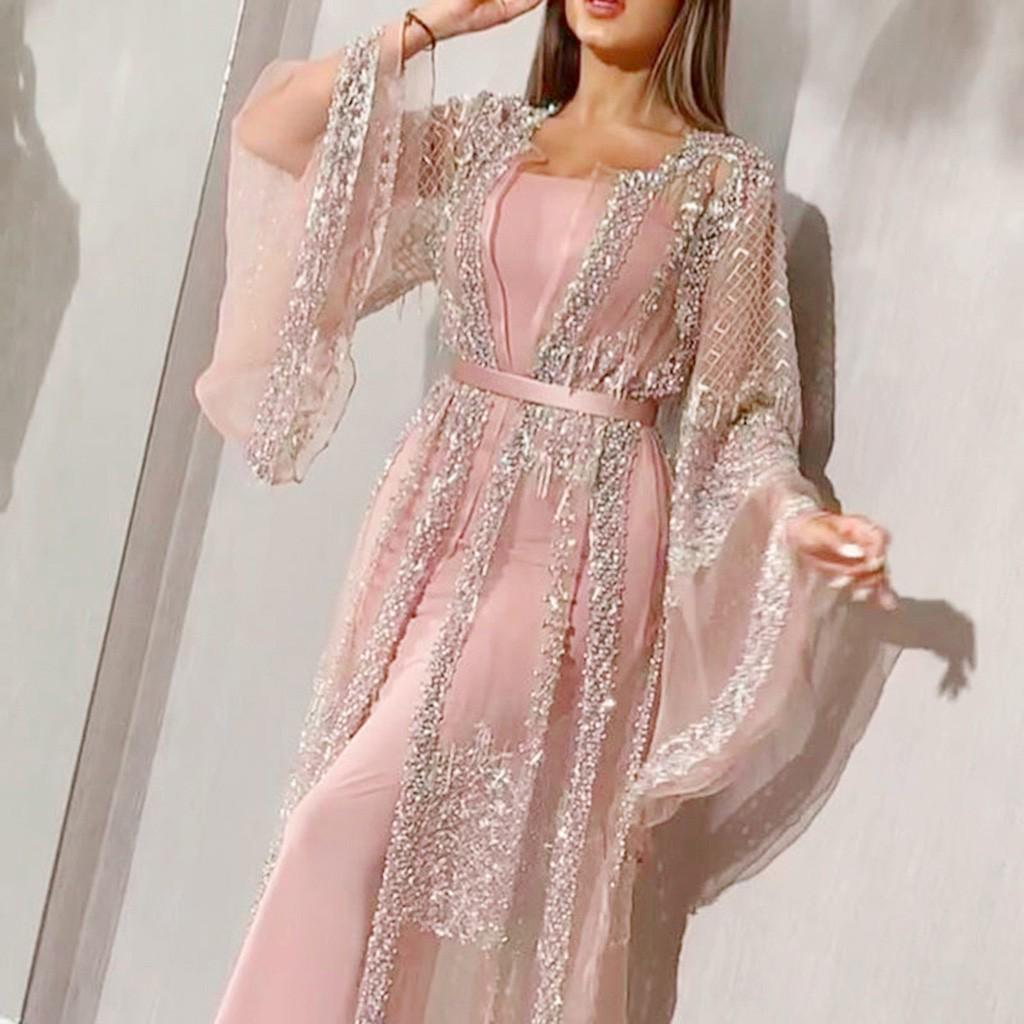 Abito lungo da donna in rete con paillettes a maniche lunghe. Abito lungo in due pezzi