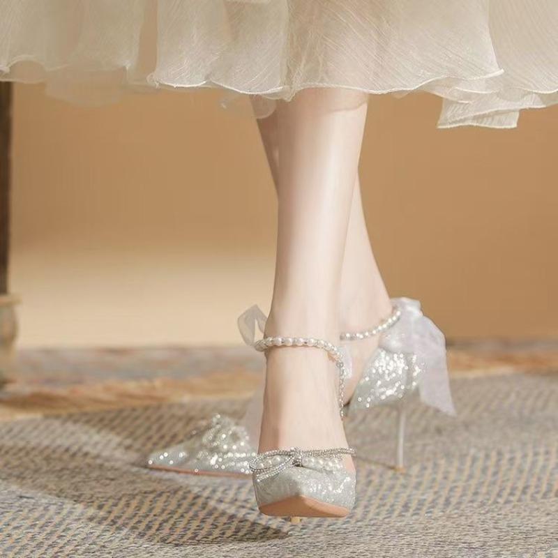 Talons hauts argentés pour femmes nouvelles chaussures à nœud et cristaux chaussures de mariage talons fins bout pointu style féerique dame haut de gamme