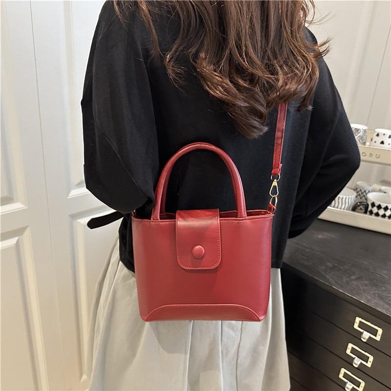 Premium simple niche fashion handbag women's summer new bucket bag single shoulder oblique span women's bag
