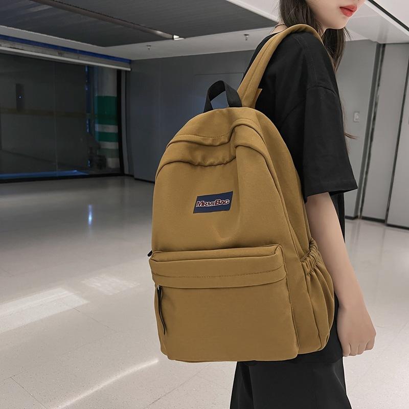 Zaino alla moda Zaino da scuola per donna 1011 Nuovo Zaino per studente di scuola media Stile College Zaino scolastico Edizione coreana Moda Colore solido Zaino da viaggio