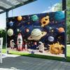 A family party backdrop themed around space - colorful polyester fabric decorations