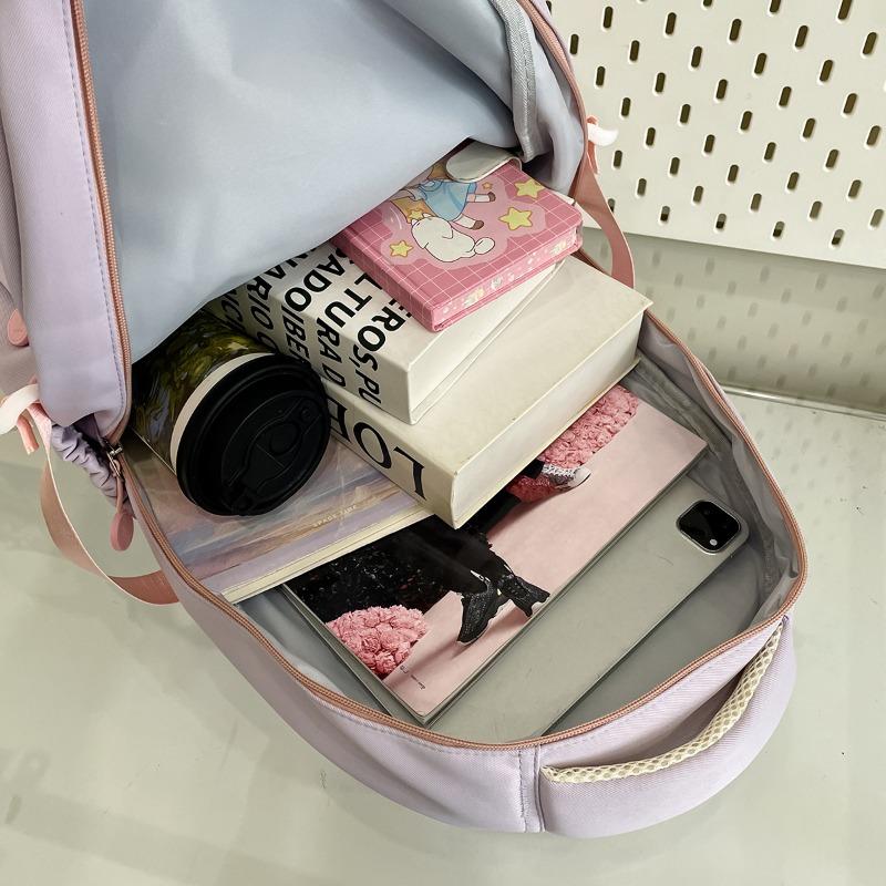 The new schoolbag is high-value, fresh and sweet, and the backpack is light for junior high school students to travel and large-capacity backpack.
