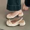 French temperament women's single shoes bow hollow bag head sandals 2025 spring new gentle and sweet back empty low heels