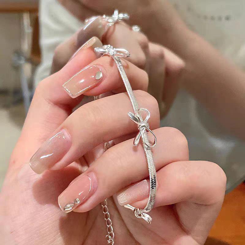 Elegant S925 Sterling Silver Snake Chain Bow Knot Necklace - Fashionable, Individual, and Versatile High-End Style for Women. 925 Sterling Silver