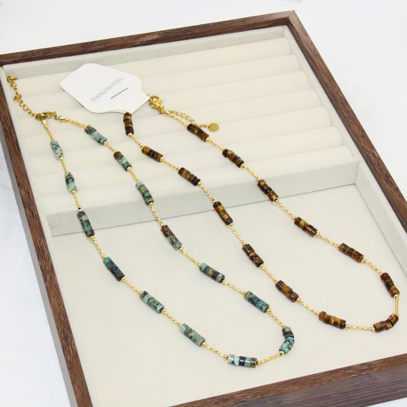 Tigerauge Perlenkette: Hochwertige Luxus-Claviculakette aus Titanstahl mit Naturstein für Herbst/Winter.