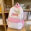 New high-value, fresh and sweet candy-colored striped backpack, high school student large-capacity backpack.
