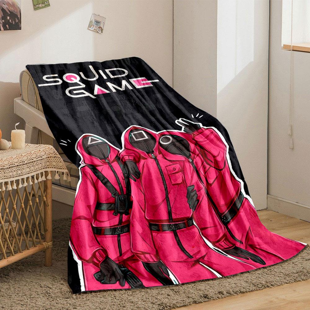 Red hooded figures with geometric masks on a dark tiled background. for all seasons blanket lunch break throw gift