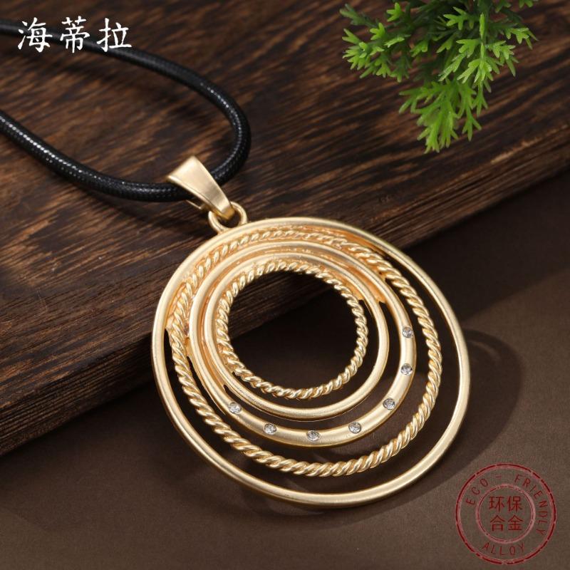 New dumb gold hollow disc leather rope long pendant, women's creative exaggerated geometric ring long necklace