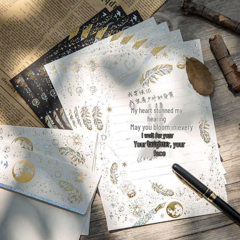 Retro vánoční hlavičkový papír a papír na dárkové vzkazy s ražbou stříbrnou fólií a motivem hvězdné oblohy