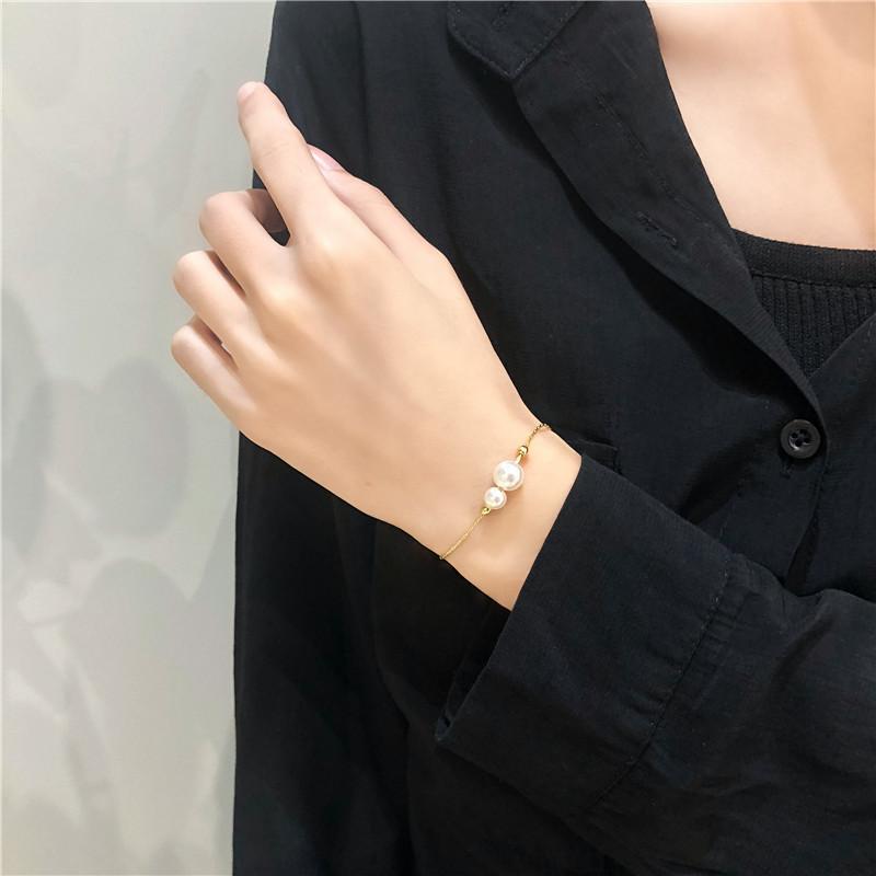 DIEYURO 316L Stainless Steel Golden Elegant Faux Pearl Accents Chic Pullable Bracelet Lady Classic Non-fading Hand Chain Jewelry