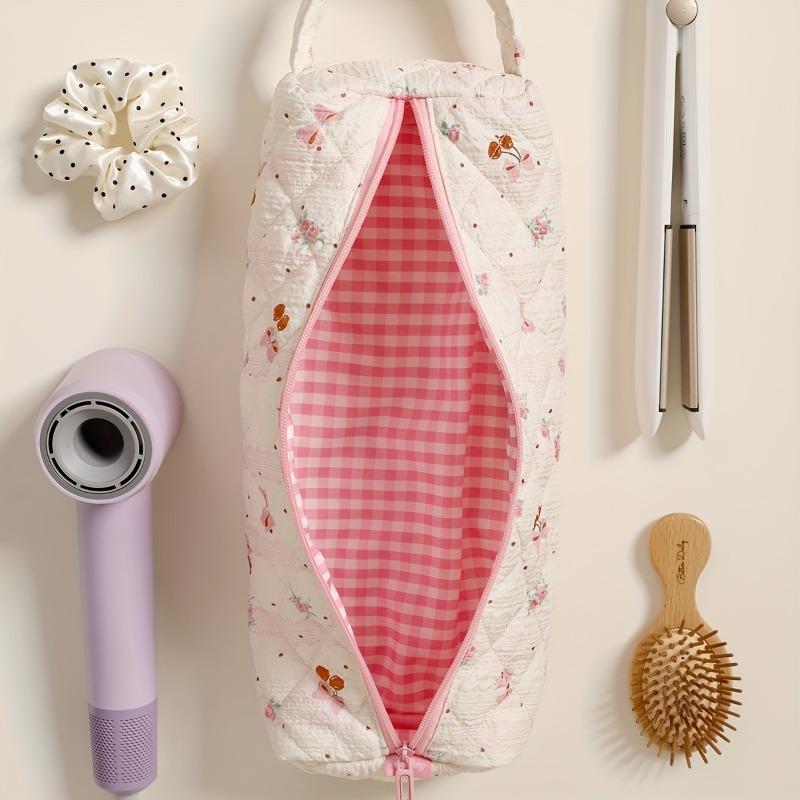 Aufbewahrungstasche für Haarpflegegeräte mit Reißverschluss und Schleifendesign. Staubdicht für Haartrockner und Styling-Werkzeuge, ideal für Reisen und den täglichen Gebrauch.