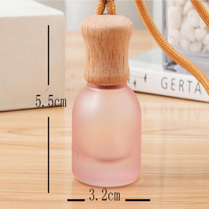 1 Stück nachfüllbare Auto ätherisches Öl Diffusor Flasche 11 ml Leerer Auto Lufterfrischer Anhänger Parfüm Glasflasche mit Holzkappen