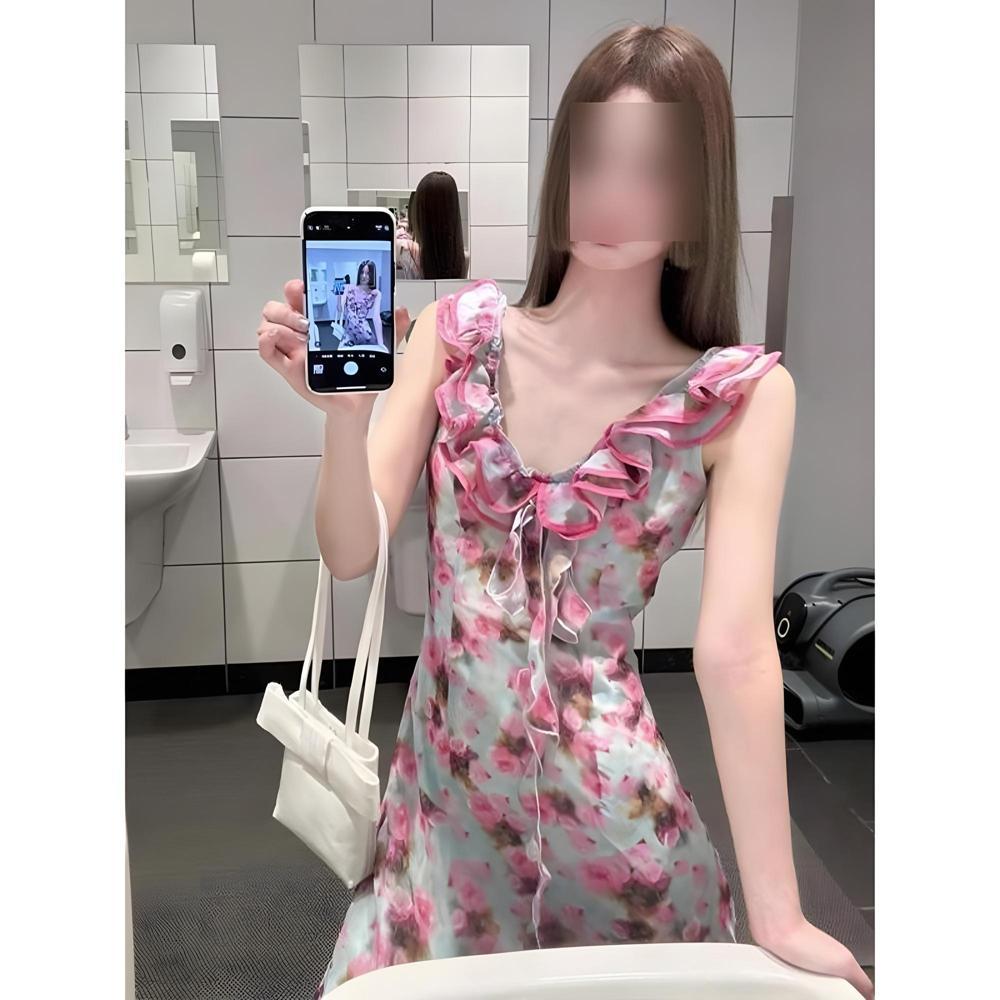 Sleeveless V-neck seaside vacation wear long dress for women's early summer new floral unique and beautiful waist pinch dress