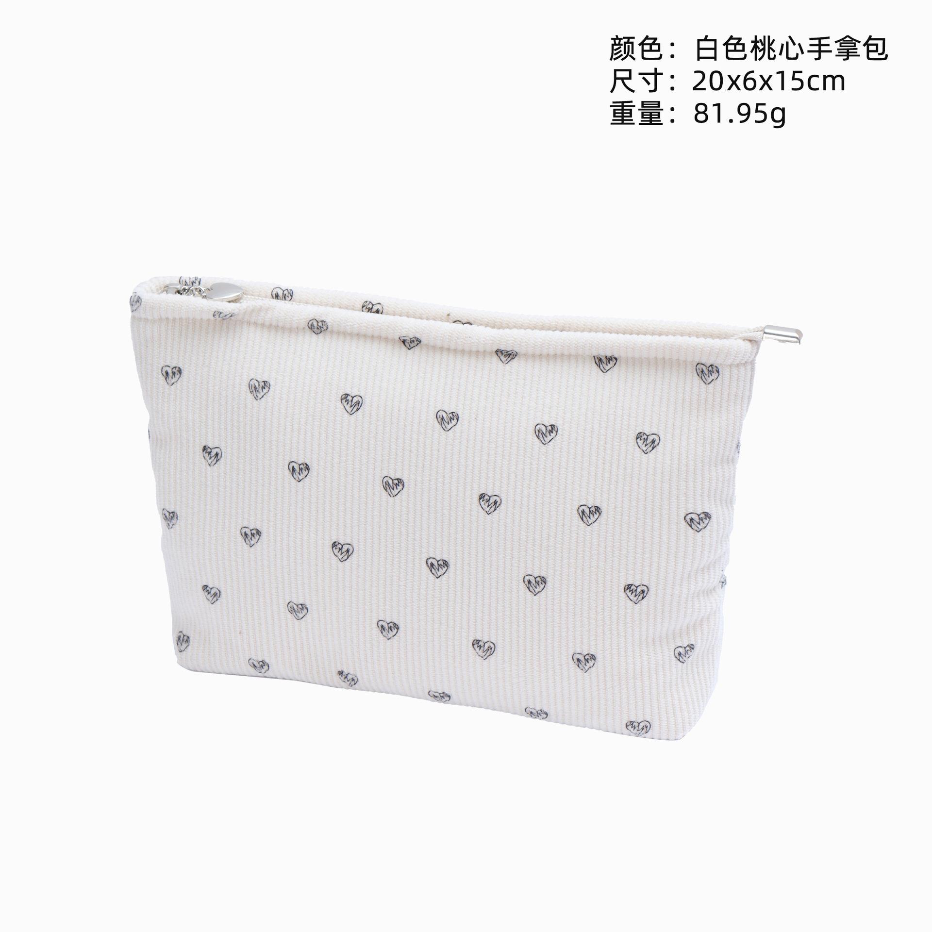 Peach heart cosmetic bag, new ins wind corduroy cosmetic storage bag, portable cosmetic bag, large capacity and advanced sense