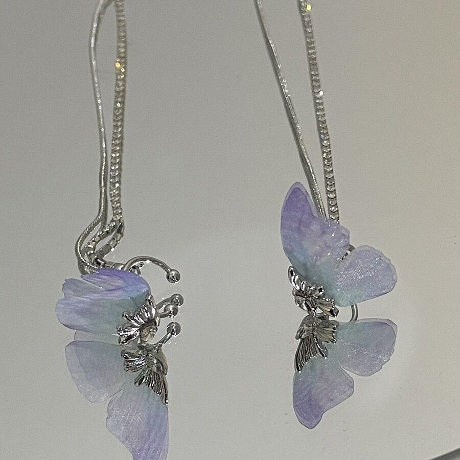 Super fairy diamond-set purple butterfly long fringed ear clips, niche design, no ear piercings, ear bone clips, personalized temperament earrings.