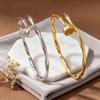 Elegante Bracciale in Acciaio di Titanio con Nodi di Bambù - Accessorio di Lusso Leggero di Alta Gamma