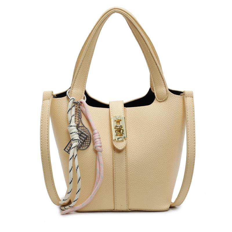 This Year's Popular Simple Ou Ruofeng Lychee Pattern Hand Carrying Bucket Bag Fashion Temperament Versatile High Sense Messenger Women's Bag