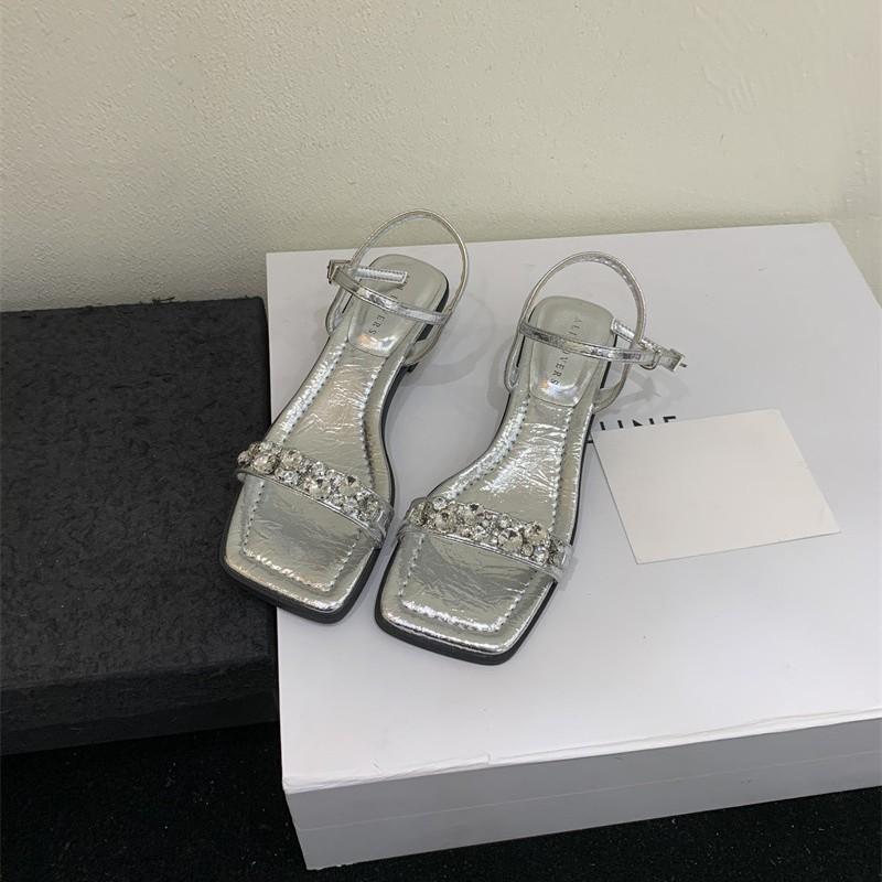 

Summer beautiful silver one-word strap medium thick heel sandals female 2025 new with skirt fairy style French high heels 40 серебряный