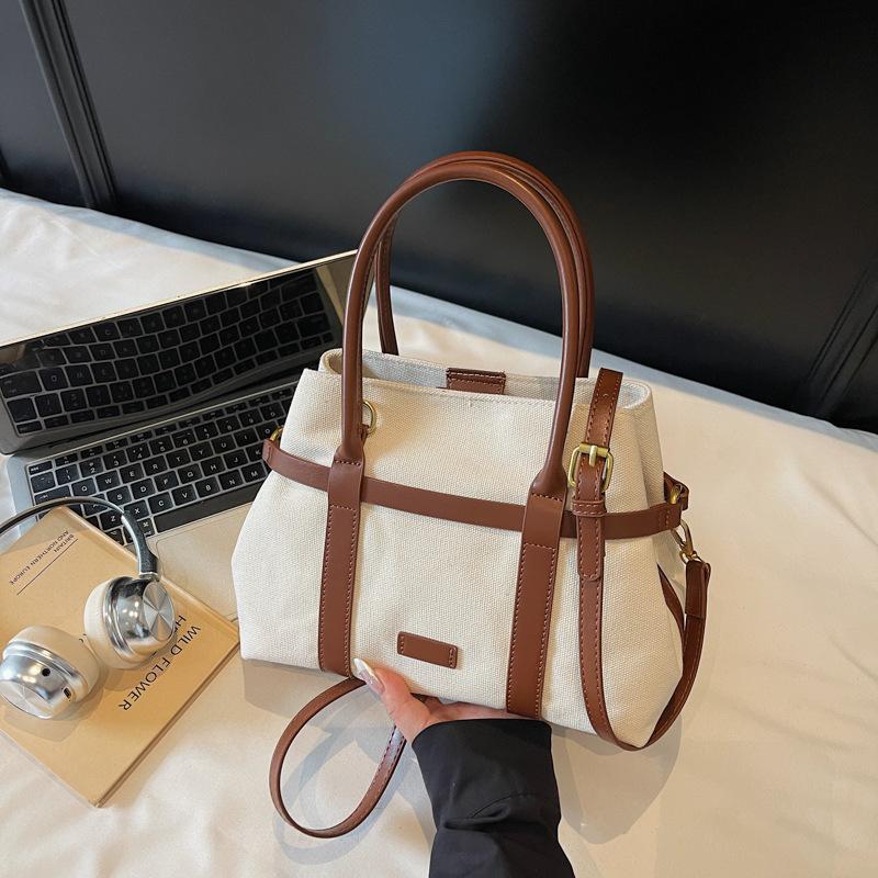 

Casual large-capacity handbag bag women s bag 2025 new simple contrasting color tote bag versatile messenger canvas bag