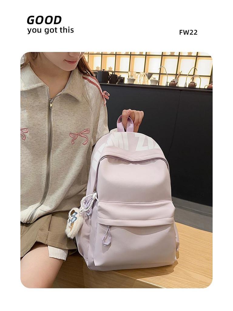 Versatile Letter Print Backpack for Students - Large Capacity for Junior High, High School, University, and Commuting.