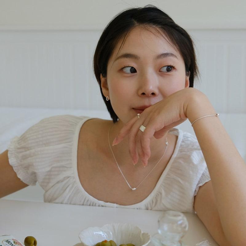 Pinaf O. Drawing Ball Necklace