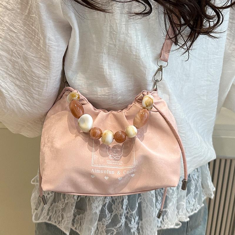 

New Chinese-style national style bag women s 2025 new summer foreign style versatile oblique span bag fashionable portable bucket bag рожевий