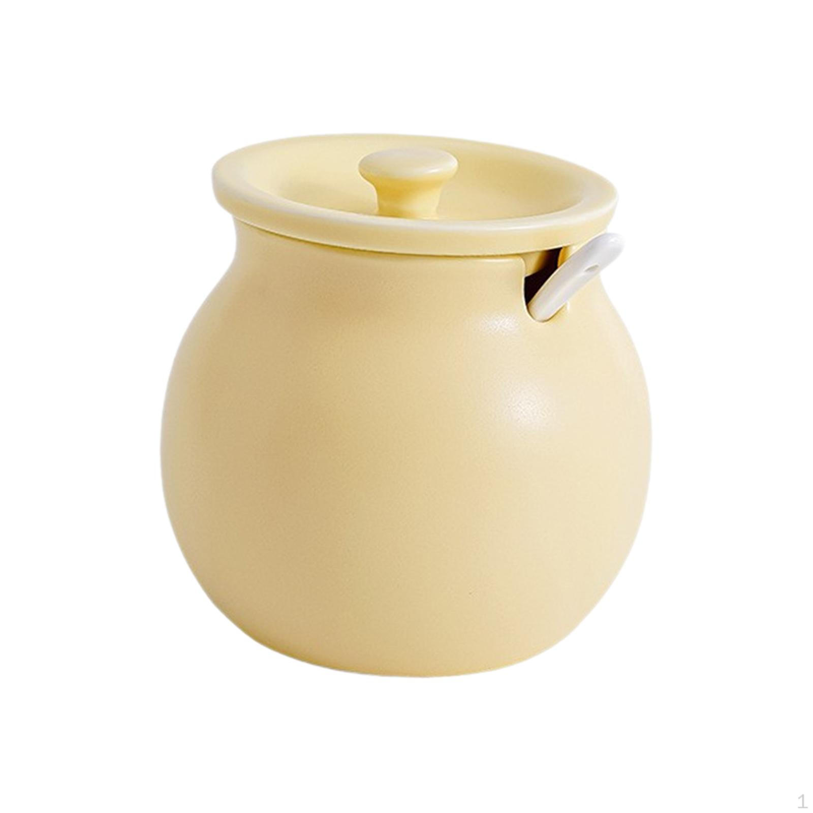 

Элегантный контейнер с крышкой и ложкой для кухни S жёлтый