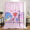 Cute penguins enjoying a meal with a heart motif and pastel checkered backdrop. for all seasons blanket lunch break throw gift