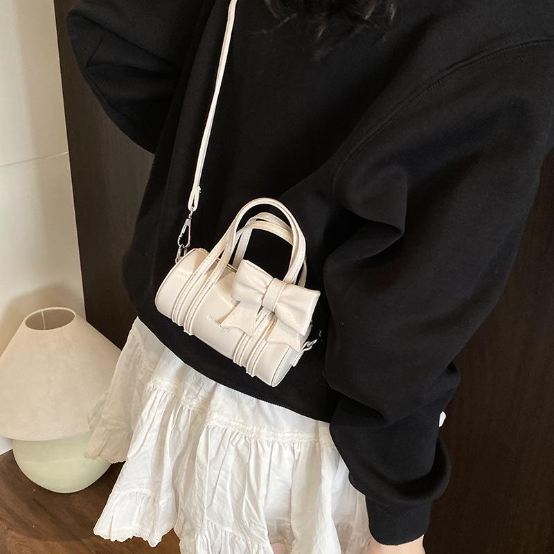 Simple and compact handbag bag women's 2026 summer new Korean bow crossbody Boston bag