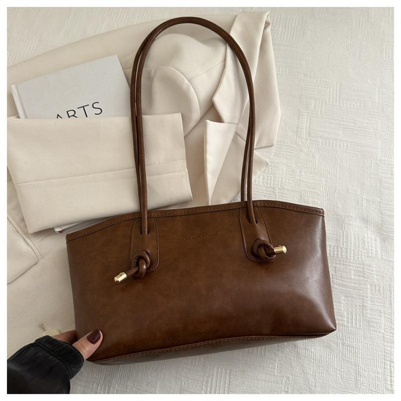 

Сумка премиум-текстуры в стиле ретро большой вместимости женская новая летняя дорожная сумка через плечо для通勤, портативная сумка-тоут single package without pendant темно-коричневого